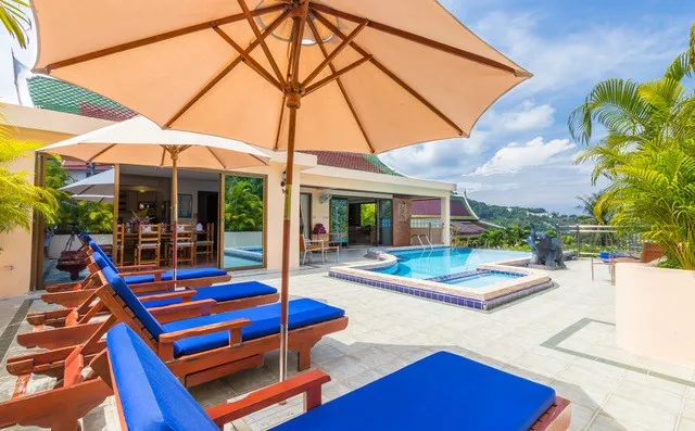 Pool terrace with sun loungers